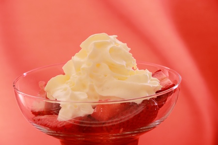 strawberry in cocktail glass with syrup of chocolate or vinegar and creamの写真素材