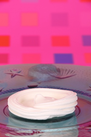 meringue case or shell on blue glass plateの写真素材
