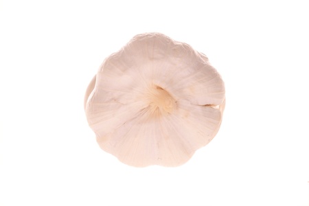 a garlic bulb segments isolated over whiteの写真素材