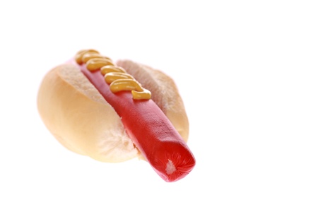 extra large foot long hot dog and mustard in bun isolatedの写真素材
