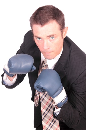 business man boxing punching bag concept imageの写真素材