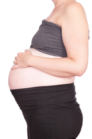 Pregnant woman 2nd Trimester with tiwns isolated with strecth marksの写真素材