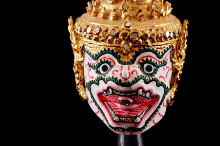 thai traditional Souvenir warrior dance animal mask isolated on blackの写真素材