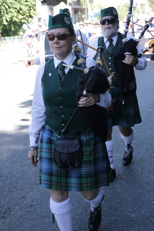 BRISBANE, AUSTRALIA - MAY 2 : bagpiper playing march music for protest labour day marchers  May 2, 2011 in Brisbane, Australia のeditorial素材