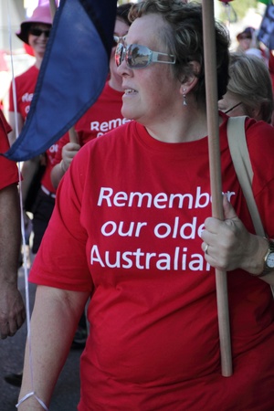 BRISBANE, AUSTRALIA - MAY 2 : woman with equal rights for older workers protest shirt in labour day march May 2, 2011 in Brisbane, Australia のeditorial素材