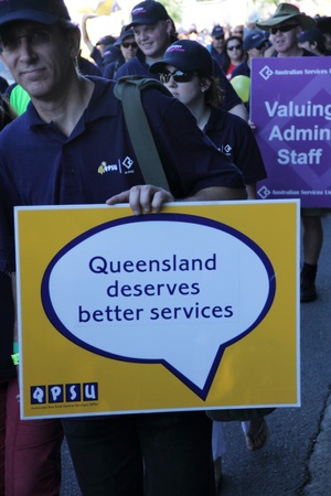 BRISBANE, AUSTRALIA - MAY 2 : Man holding qpsu banner as part of labour day march  May 2, 2011 in Brisbane, Australia のeditorial素材