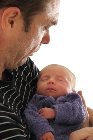newborn baby cuddle snuggle with parent picture isolatedの写真素材