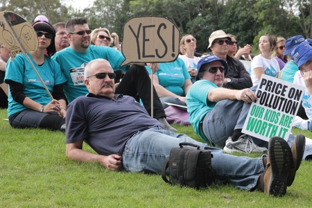 BRISBANE, AUSTRALIA - JUNE 6 : crowds with say Yes and  pro carbon tax signs listening to rally speakers during World Enviroment Day say yes protest 6, 2011 in Brisbane, Australia のeditorial素材