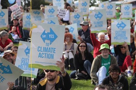 BRISBANE, AUSTRALIA - JUNE 6 : crowds with say Yes to cutting carbon pollution and clean energy signs at rally during World Enviroment Day say yes protest 6, 2011 in Brisbane, Australia のeditorial素材