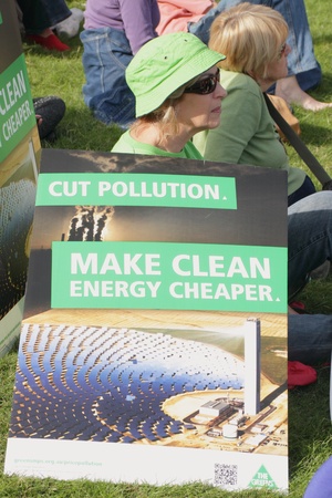 BRISBANE, AUSTRALIA - JUNE 6 : Woman with anti polution clean energy sign at say Yes to carbon tax World Enviroment Day protest 6, 2011 in Brisbane, Australia のeditorial素材