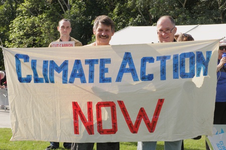 BRISBANE, AUSTRALIA - JUNE 6 : Men with climate action now sign at say Yes to carbon tax World Enviroment Day protest 6, 2011 in Brisbane, Australia のeditorial素材