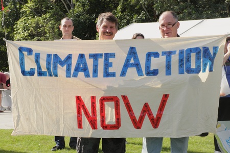 BRISBANE, AUSTRALIA - JUNE 6 : Men with climate action now sign at say Yes to carbon tax World Enviroment Day protest 6, 2011 in Brisbane, Australia のeditorial素材