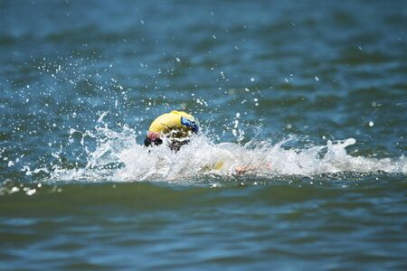BRISBANE, AUSTRALIA  NOV 27 :Open water competitor in the Great Australian Swim Series race November 27, 2011 in Brisbane, Australia のeditorial素材