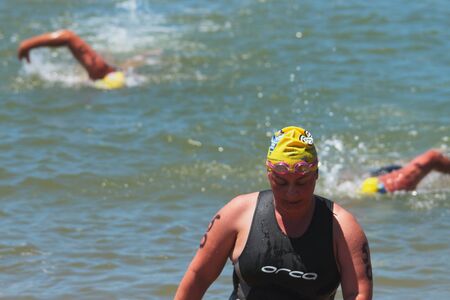 BRISBANE, AUSTRALIA  NOV 27 :Entrant number 50 exhausted at end of Great Australian Swim Series race November 27, 2011 in Brisbane, Australia のeditorial素材