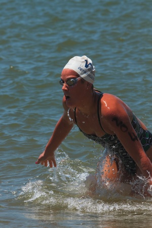 BRISBANE, AUSTRALIA  NOV 27 :Elite swimmer racing out of water to place at the Great Australian Swim Series race November 27, 2011 in Brisbane, Australia のeditorial素材
