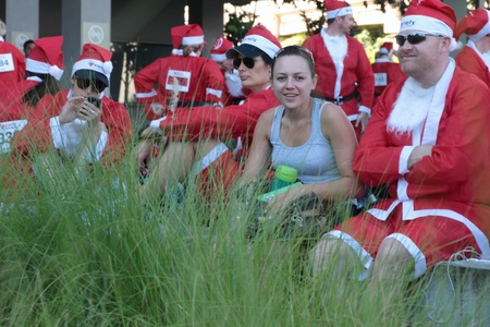 BRISBANE, AUSTRALIA  NOV 27 :Unidentified women spectator with unidentified santas before Variety...