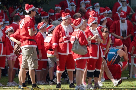 BRISBANE, AUSTRALIA  NOV 27 :Group of unidentified santas gather for warm up pre Variety Santa Fun Run November 27, 2011 in Brisbane, Australia のeditorial素材