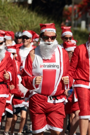 BRISBANE, AUSTRALIA  NOV 27 :Unidentified santa in training outfit during Variety Santa Fun Run November 27, 2011 in Brisbane, Australia のeditorial素材