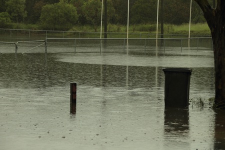 BRISBANE, AUSTRALIA - JAN 25 : One year on Brisbane flooding again, Redcliffe Peninsula Australian Football Club underwater January 25, 2012 in Brisbane, Australia のeditorial素材