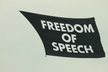 A random protest freedom of speech flags flys over brisbane with no other protestsの写真素材