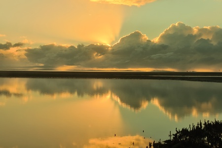 amazing crossed cloud over water, in the background brisbaneの写真素材