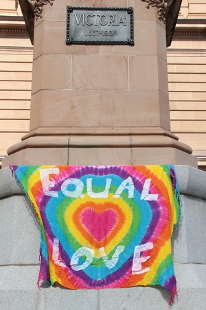 BRISBANE, QLD AUSTRALIA - AUGUST 11 : Equal love sign at protest on Queen Victoria statue on August 11 2012  in Brisbane, Australia  Equal Love is a gay rights group supporting gay marriageのeditorial素材