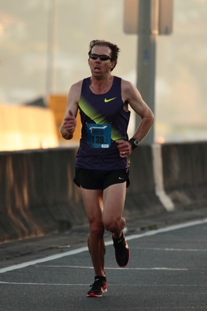 BRISBANE, AUSTRALIA - SEPTEMBER 02 : Dennis Fitzgerald  participating in the "Bridge to Brisbane" charity fun run on September 02, 2012 in Brisbane, Australiaのeditorial素材
