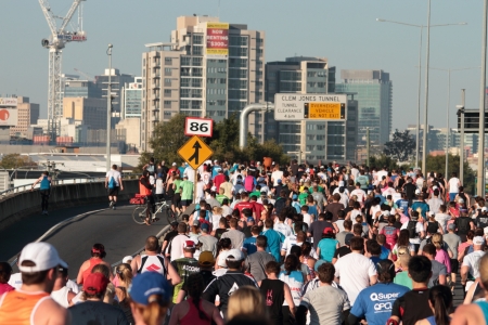 BRISBANE, AUSTRALIA - SEPTEMBER 02 : Unidentified runners  participating in the Bridge to Brisbane charity fun run on September 02, 2012 in Brisbane, Australiaのeditorial素材