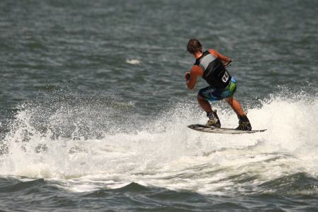 BRISBANE, AUSTRALIA - SEPTEMBER 15 :  World champion Cory Teunissen giving wakeboarding demonstration as part of Australian Water Ski Racing Championship on September 15, 2012 in Brisbane, Australiaのeditorial素材