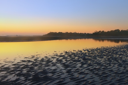 mud ripple typical of only sandgate brisbane beach copy space background australiaの写真素材