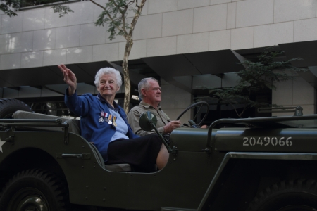 BRISBANE, AUSTRALIA - APRIL 25 : Veteran waves to crowd from jeep  during Anzac day commemorations  April 25, 2013 in Brisbane, Australiaのeditorial素材