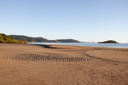 cannonvale beach reserve in Airlie Beach whitsundays tropical holiday region of far north queensland australiaの写真素材