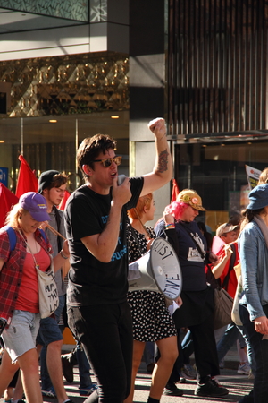 BRISBANE, AUSTRALIA - JUNE 22 : Anti governement  immigration policy protesters marching streets during World Refugee Rally June 22, 2014 in Brisbane, Australiaのeditorial素材