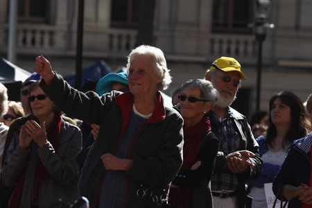 BRISBANE, AUSTRALIA - JULY 06 : Unidentified older Australians applauding the speakers  at Bust The Budget anti liberal governement Rally July 06, 2014 in Brisbane, Australiaのeditorial素材