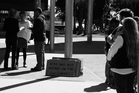 CABOOLTURE, AUSTRALIA - AUGUST 30: Unidentified anti LNP government protestersgathering before signs are distributed at March Australia Rally August 30, 2014 in Caboolture, Australiaのeditorial素材