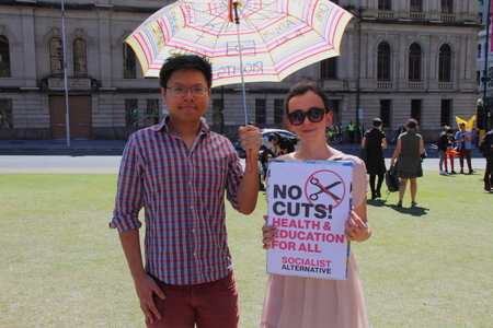 BRISBANE, AUSTRALIA - AUGUST 31: Unidentified protesters with anti government education and healthcare policy signs at March Australia Rally August 31, 2014 in Brisbane, Australiaのeditorial素材