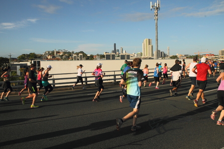 BRISBANE, AUSTRALIA - SEPTEMBER 07 : Unidentified runners  participating in the "Bridge to Brisbane" charity fun run on September 07, 2014 in Brisbane, Australiaのeditorial素材