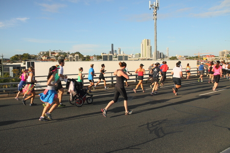BRISBANE, AUSTRALIA - SEPTEMBER 07 : Unidentified runners  participating in the "Bridge to Brisbane" charity fun run on September 07, 2014 in Brisbane, Australiaのeditorial素材