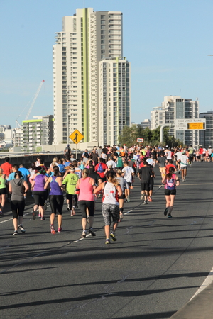 BRISBANE, AUSTRALIA - SEPTEMBER 07 : Unidentified runners  participating in the "Bridge to Brisbane" charity fun run on September 07, 2014 in Brisbane, Australiaのeditorial素材