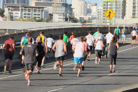 BRISBANE, AUSTRALIA - SEPTEMBER 07 : Unidentified runners  participating in the "Bridge to Brisbane" charity fun run on September 07, 2014 in Brisbane, Australiaのeditorial素材