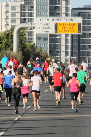 BRISBANE, AUSTRALIA - SEPTEMBER 07 : Unidentified runners  participating in the "Bridge to Brisbane" charity fun run on September 07, 2014 in Brisbane, Australiaのeditorial素材