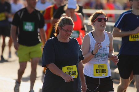 BRISBANE, AUSTRALIA - SEPTEMBER 07 : Unidentified runners  participating in the "Bridge to Brisbane" charity fun run on September 07, 2014 in Brisbane, Australiaのeditorial素材