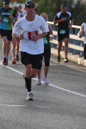 BRISBANE, AUSTRALIA - SEPTEMBER 07 : Unidentified runners  participating in the "Bridge to Brisbane" charity fun run on September 07, 2014 in Brisbane, Australiaのeditorial素材
