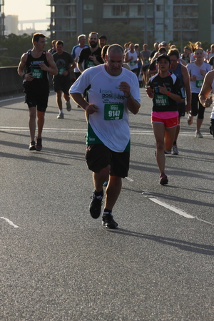BRISBANE, AUSTRALIA - SEPTEMBER 07 : Unidentified runners  participating in the "Bridge to Brisbane" charity fun run on September 07, 2014 in Brisbane, Australiaのeditorial素材