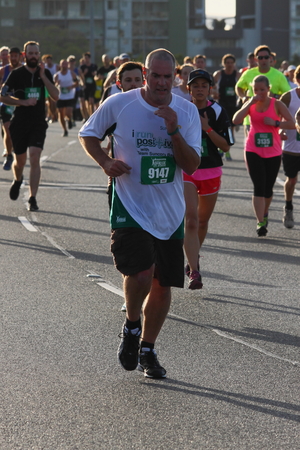 BRISBANE, AUSTRALIA - SEPTEMBER 07 : Unidentified runners  participating in the "Bridge to Brisbane" charity fun run on September 07, 2014 in Brisbane, Australiaのeditorial素材