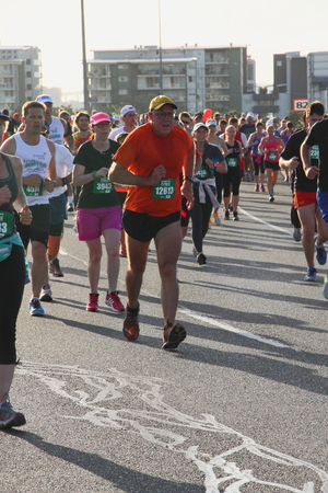 BRISBANE, AUSTRALIA - SEPTEMBER 07 : Unidentified runners  participating in the "Bridge to Brisbane" charity fun run on September 07, 2014 in Brisbane, Australiaのeditorial素材