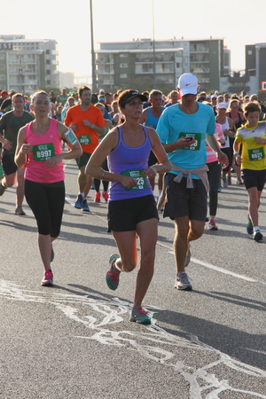 BRISBANE, AUSTRALIA - SEPTEMBER 07 : Unidentified runners  participating in the "Bridge to Brisbane" charity fun run on September 07, 2014 in Brisbane, Australiaのeditorial素材