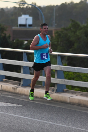 BRISBANE, AUSTRALIA - SEPTEMBER 07 : Michael Boden participating in the "Bridge to Brisbane" charity fun run on September 07, 2014 in Brisbane, Australiaのeditorial素材