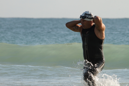 MOOLOOLABA, AUSTRALIA - SEPTEMBER 14 : Unidentified competitor in the "Ironman 70.3" triathlon on September 14, 2014 in Mooloolaba, Australiaのeditorial素材