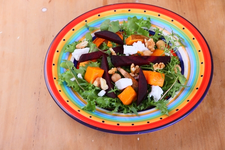 roasted beetroot and pumpkin goats cheese salad with microgreensの写真素材